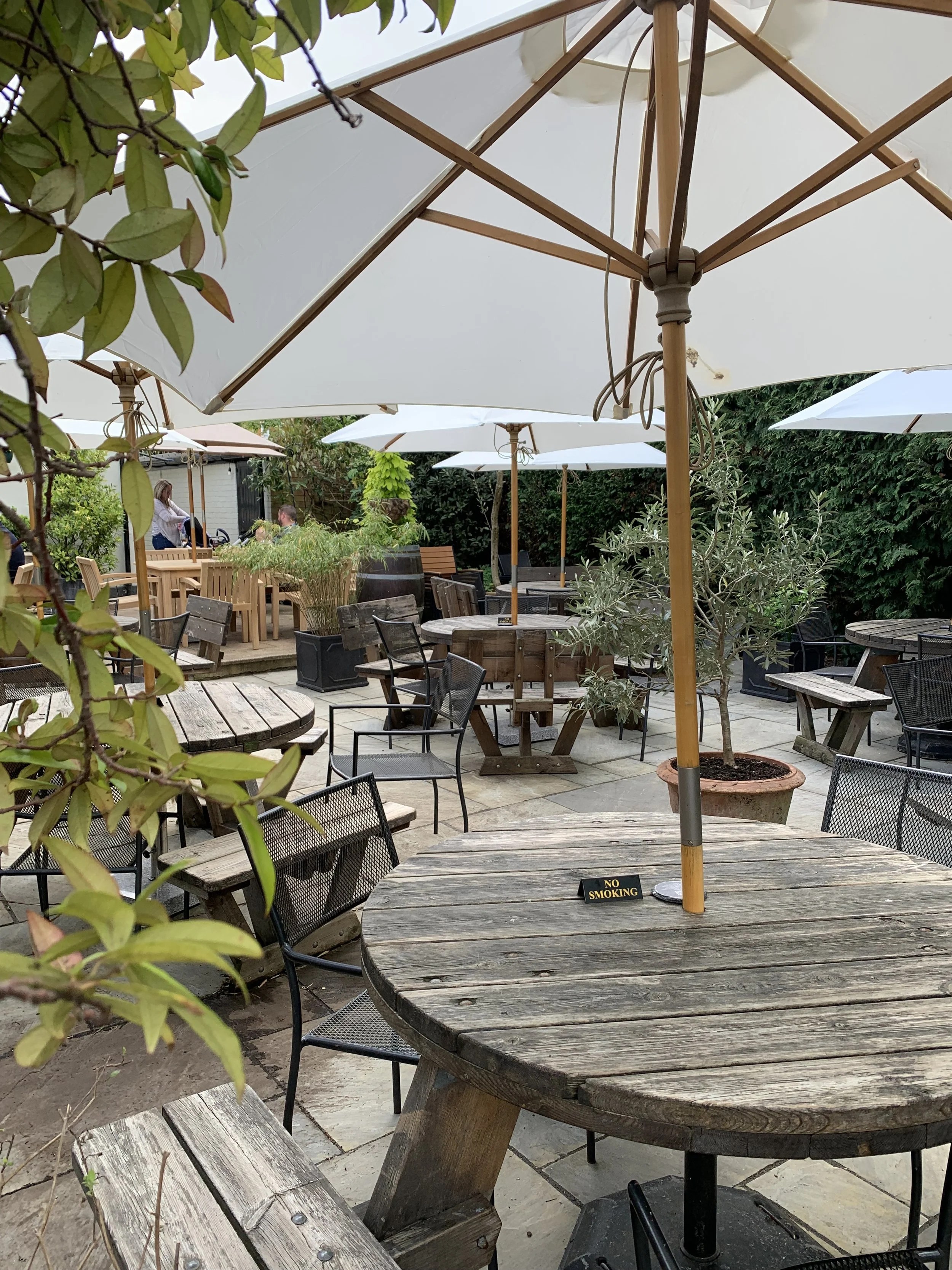 Shaded tables in the pub garden
